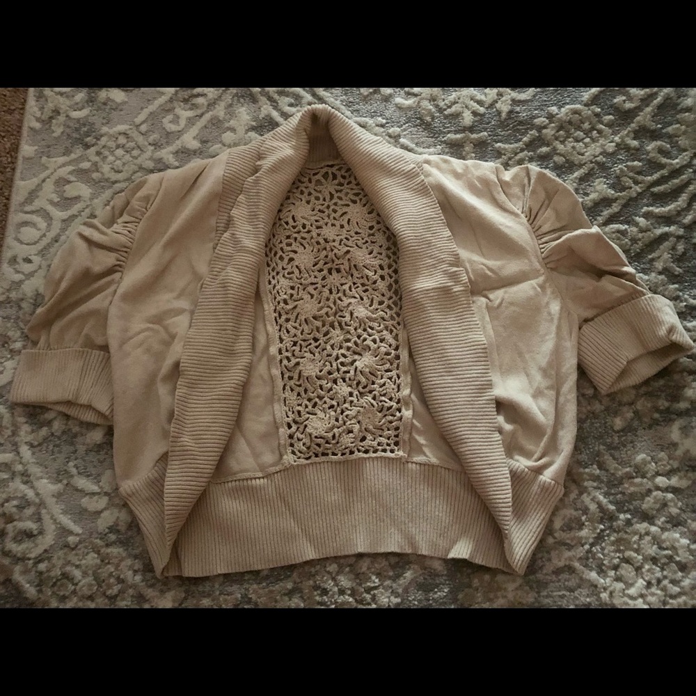 Tan cardigan sweater, crocheted back panel